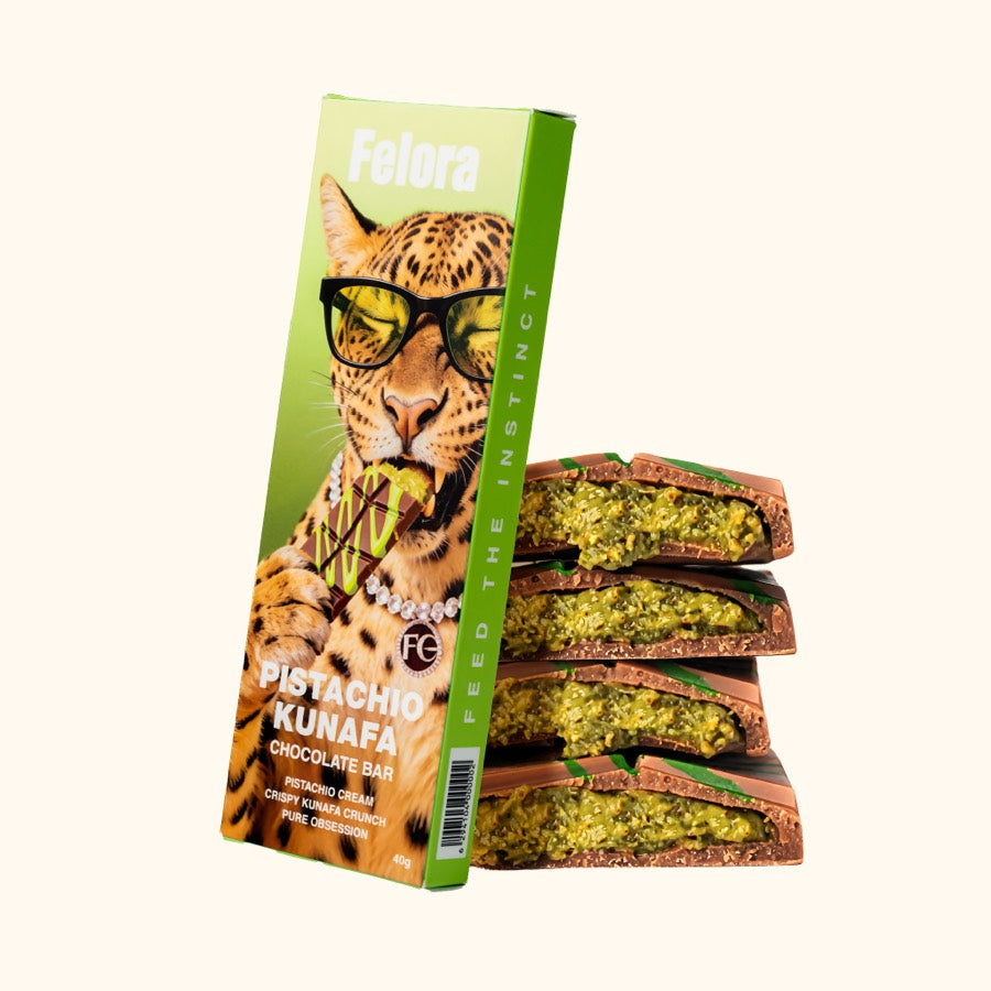 Felora Pistachio Kunafa chocolate bar broken into pieces